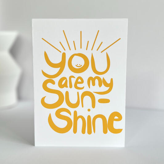 Brighten someone's day with our "You Are My Sunshine" greeting card.